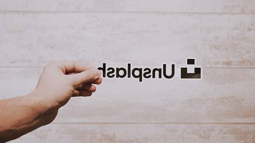 human person holding Unsplash sticker person
