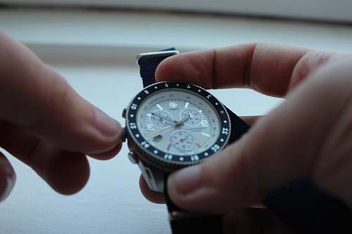 edinburgh person setting the chronograph watch united kingdom