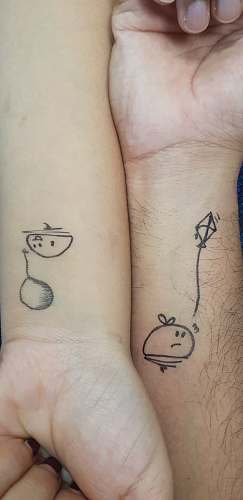 skin person showing tattoo wrist