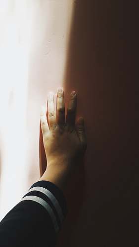 human person touching wall person