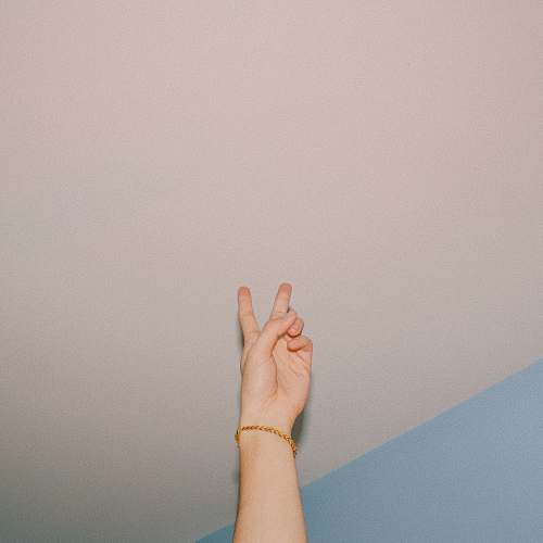 wrist person wearing gold bracelet showing hand human