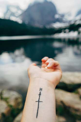 person person with wrist tattoo of North human