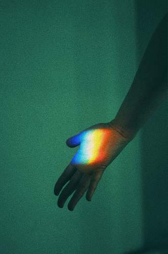 finger person's left hand light