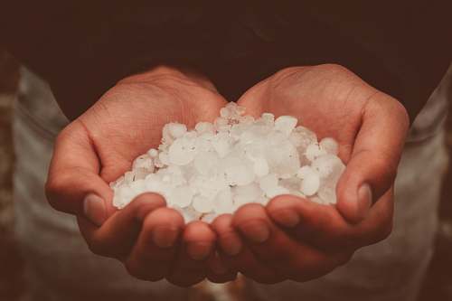 ecuador photograph of person holding snow ices quito