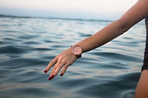 watch round silver-colored analog watch water