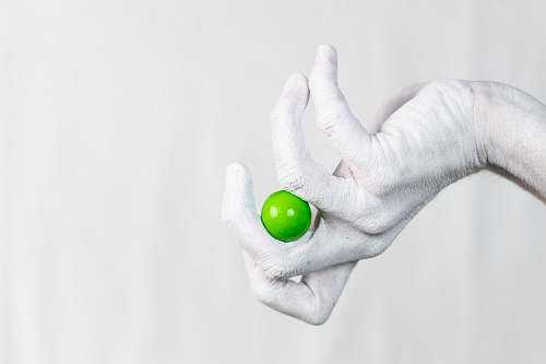 human selective focus photo of green fruit person