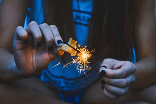 sparkler woman holding sparkler holding