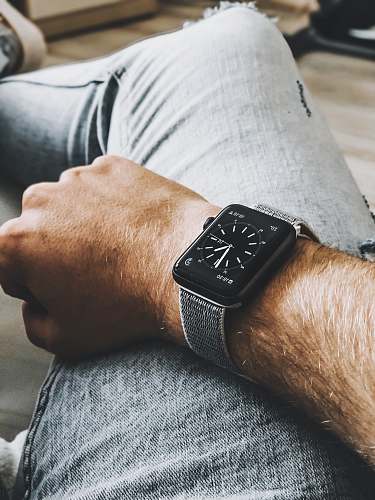 person Apple Watch wristwatch