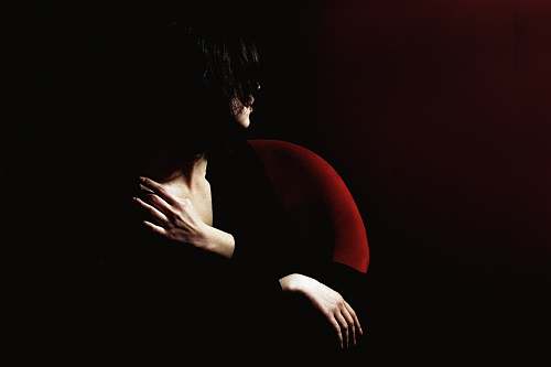 person black long-sleeved shirt people