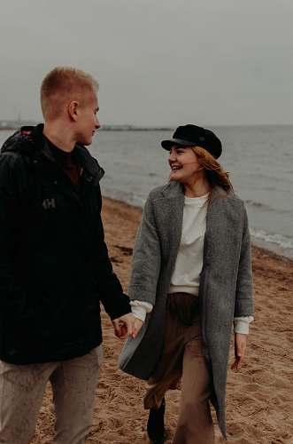 clothing couple walking on the seashore apparel