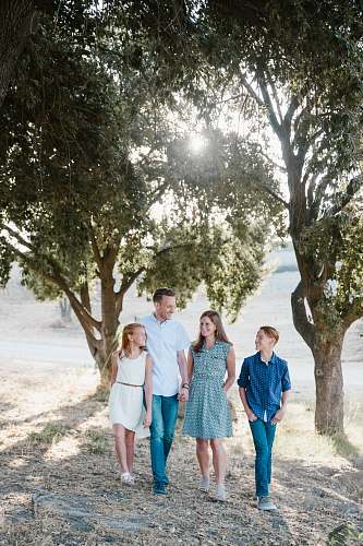 people family standing in front of trees family