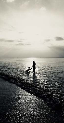 person gray-scale photo of woman and child nature