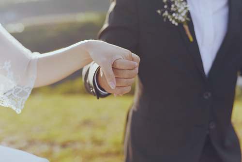 clothing groom and bride holding hands apparel
