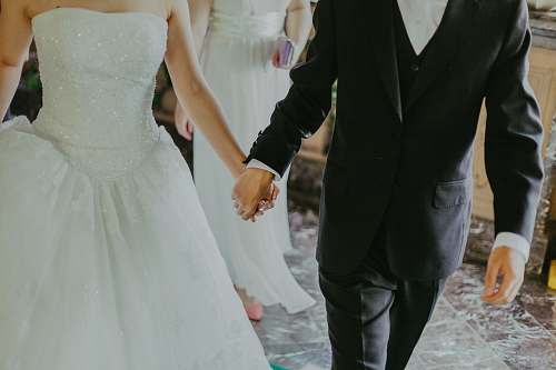 people groom and bridge holding hands holding hands