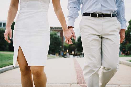person man and woman holding hands holding hands
