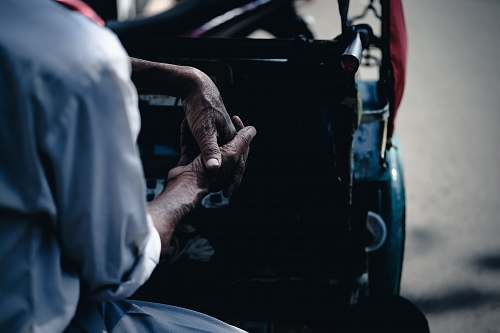person man sitting in auto rickshaw indonesia