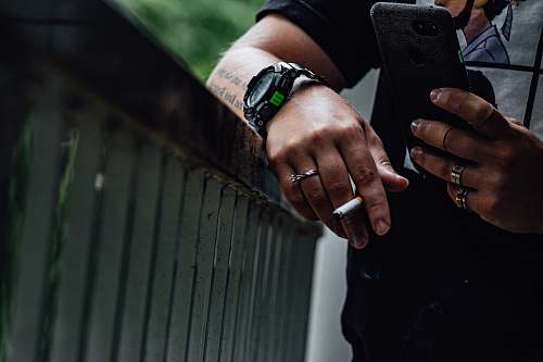 wristwatch man smoking photography phone