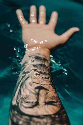 person man's portrait arm tattoo skin