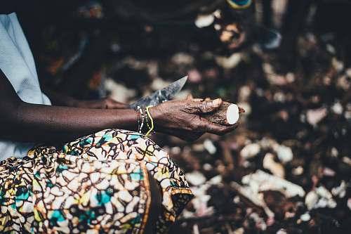 person person carving wood using knife sierra leone