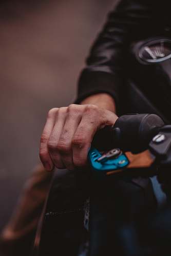person person driving vehicle close-up photo finger