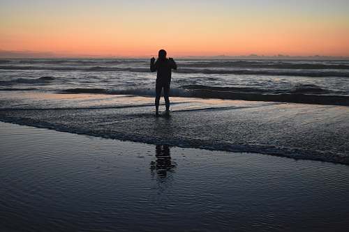 person person on seashore standing