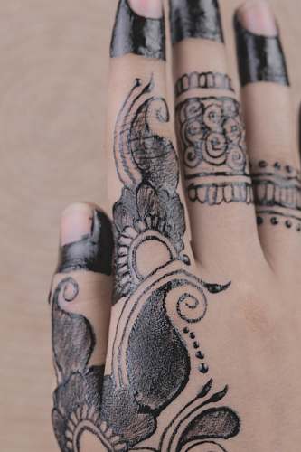 person person with mehndi fingers tattoo skin
