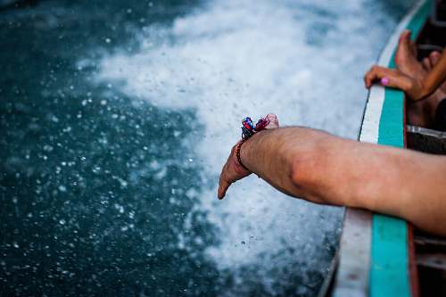 person person's hand on sea people