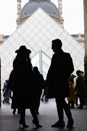 pedestrian silhouette photography of couple person