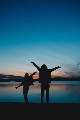 person silhouette photography unknown persons standing outdoors hand