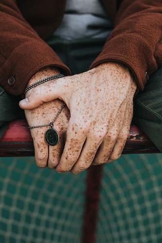 person silver-colored bracelet people