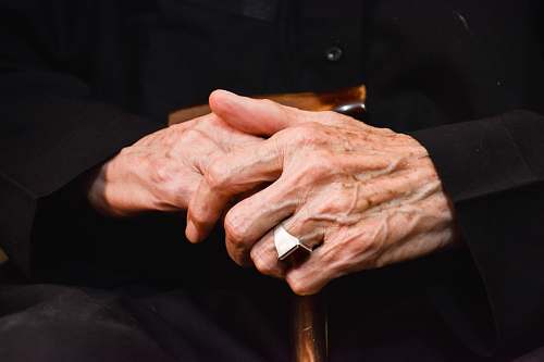hand silver-colored ring finger