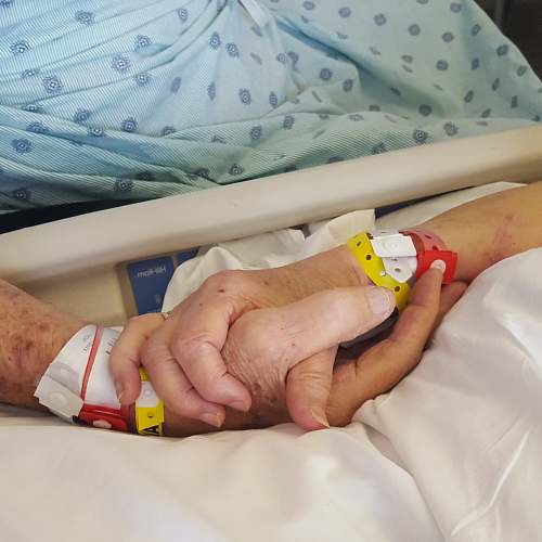 hand two persons holding hands arm