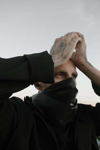 apparel woman wearing black face mask clothing