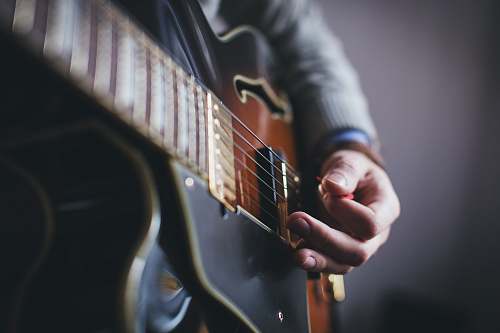 guitar person playing guitar electric guitar
