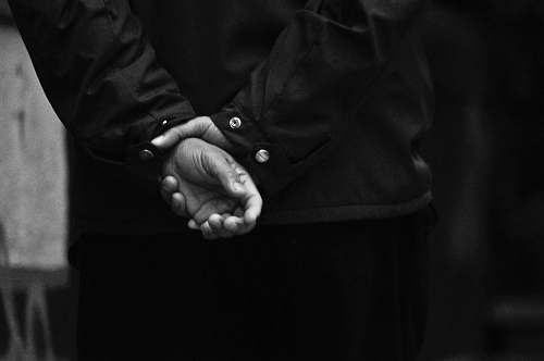 hand gray scale photo of holding hands black-and-white