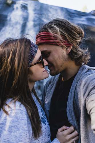 human man and woman about to kiss each other kiss