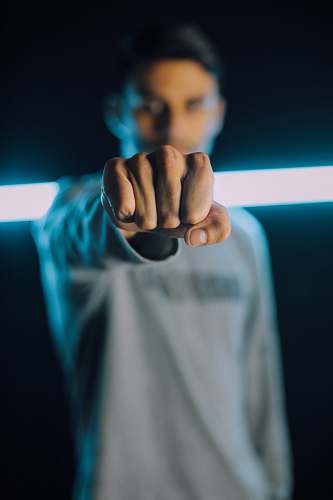 human man showing his fist hand