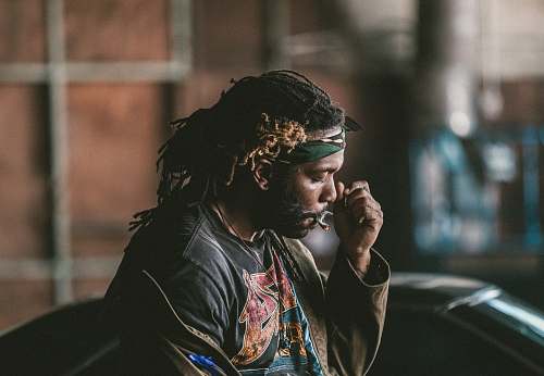 people man sitting smoking cigarette human