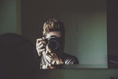 people man taking photo on mirror human