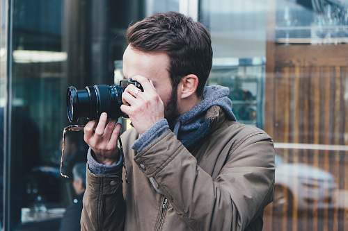 human man taking picture photographer