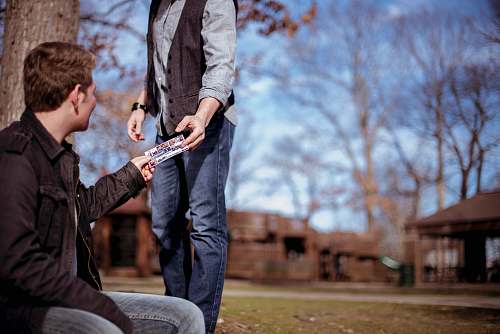 people person giving something to man human