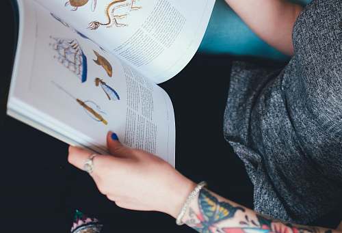 human person holding book people
