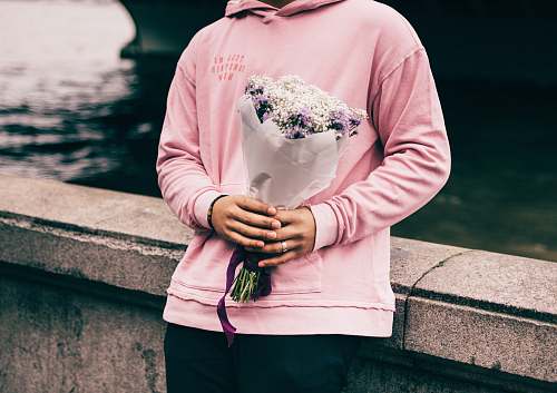 human person holding bouquet of flowers flower