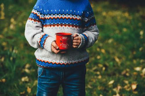 cup person holding ceramic mug people