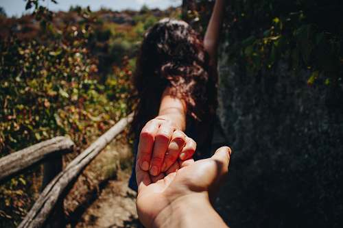 human person holding hands holding hands