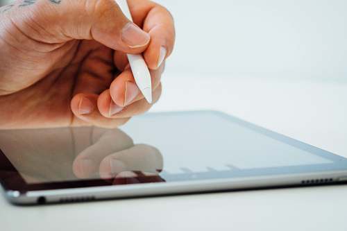 human person holding white stylus pen people