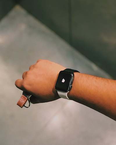 human person showing black Apple Watch wristwatch