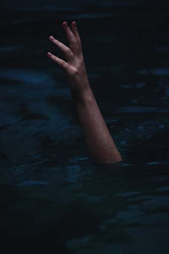 water person showing right hand from body of water human