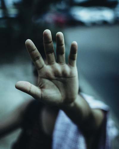 human person showing right palm finger
