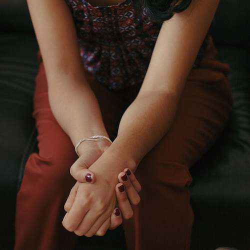 human person sitting down hand